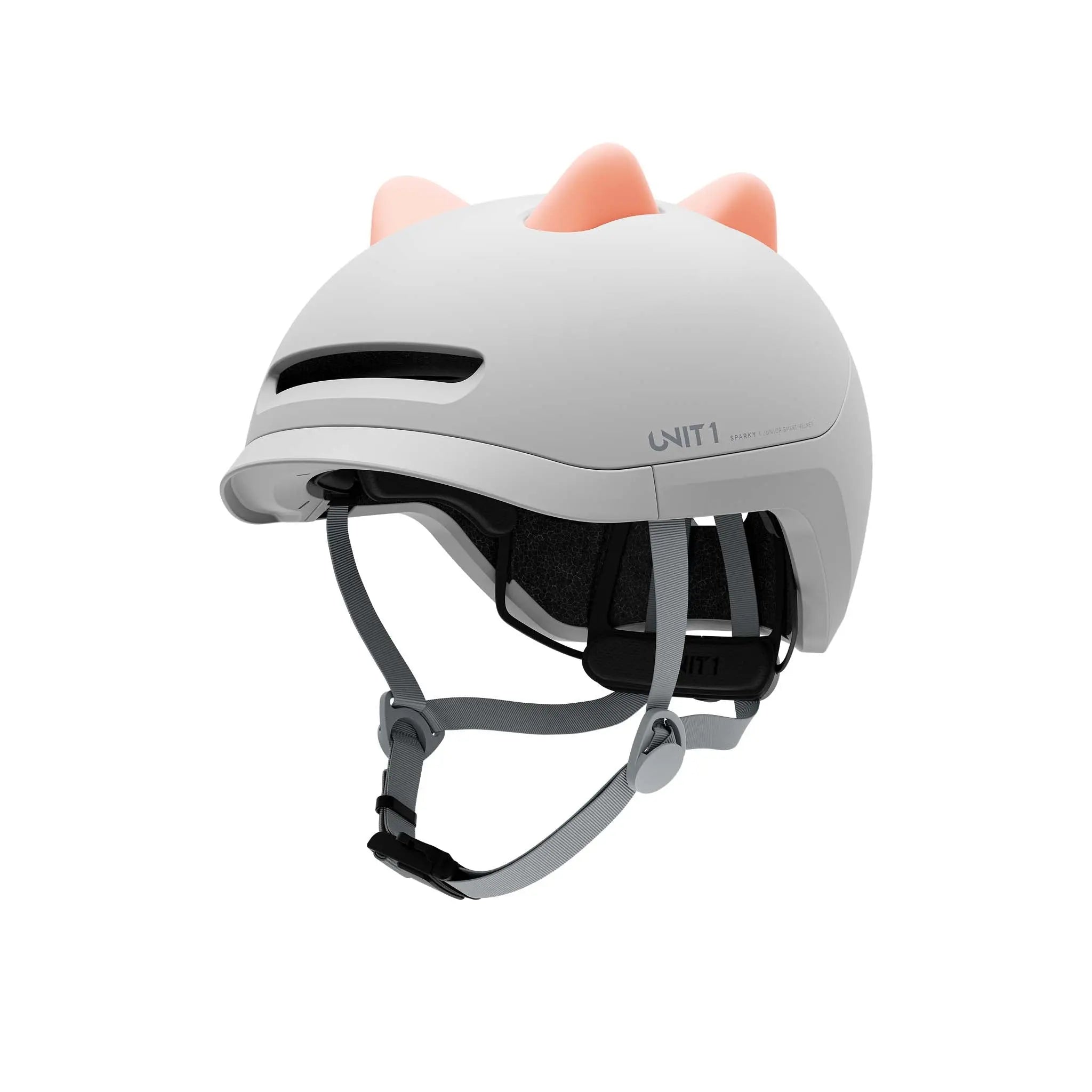 UNIT 1 Dino silicone inserts in tangerine orange, fitted to a SPARKY kids' helmet, three-quarter front view