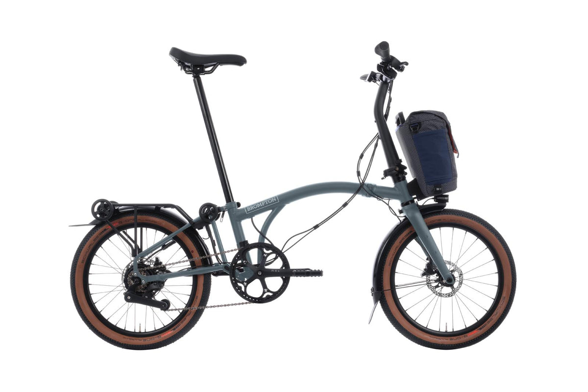 Brompton Electric G Line in lake grey — full side view with front bag