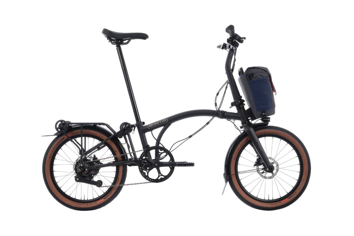 Brompton Electric G Line in space black — full side view with front bag