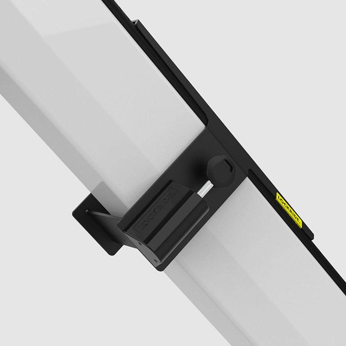 Lockride Z-Series bracket clamped over a white rack battery, close-up