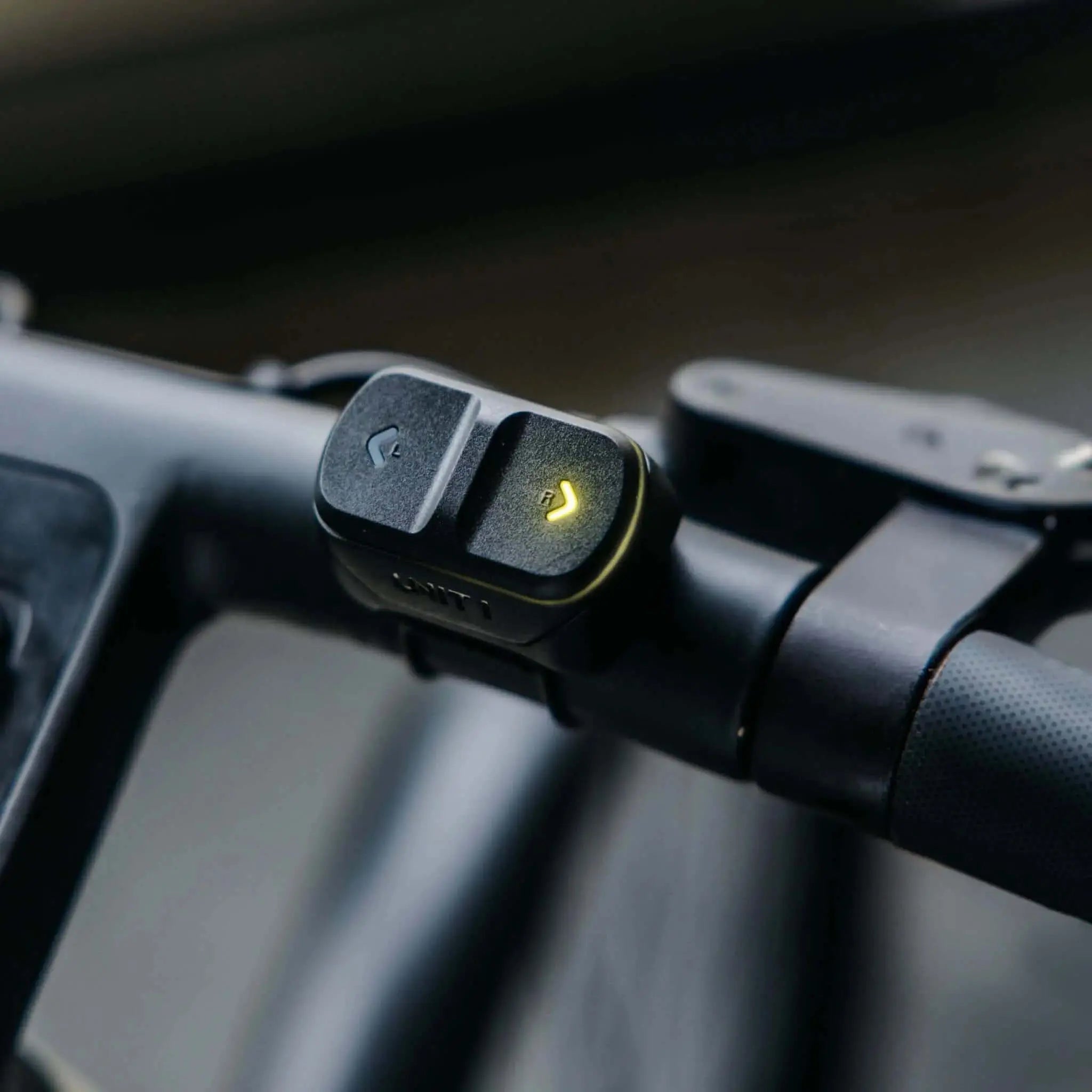 UNIT 1 Remote handlebar controller mounted on a bicycle handlebar
